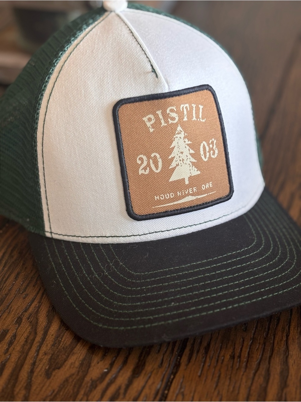 pistil White, Green & Black Men's Trucker Cap with Tan Patch